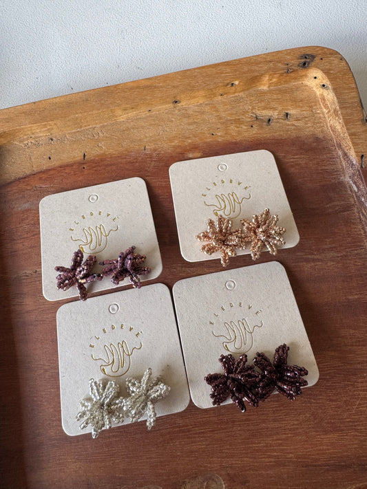 Topos palmera plateado