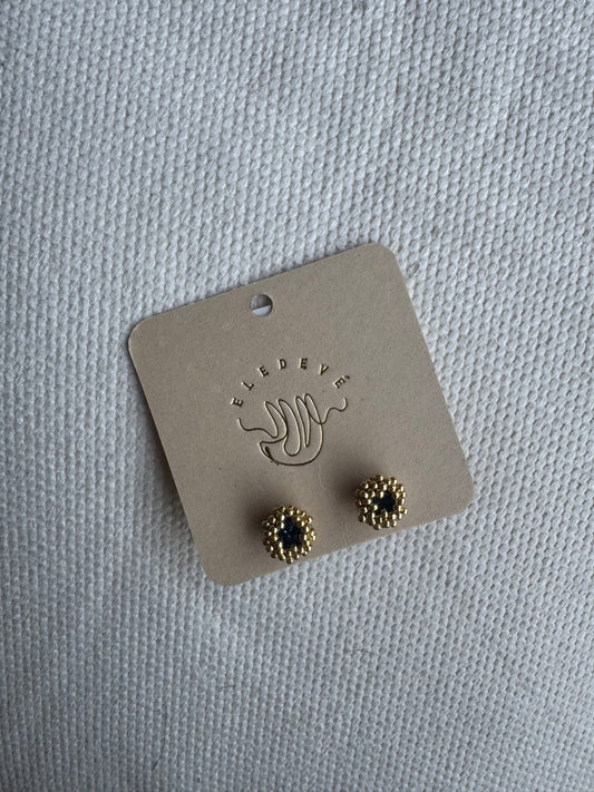 Aretas ballenatos zafiro con dorado
